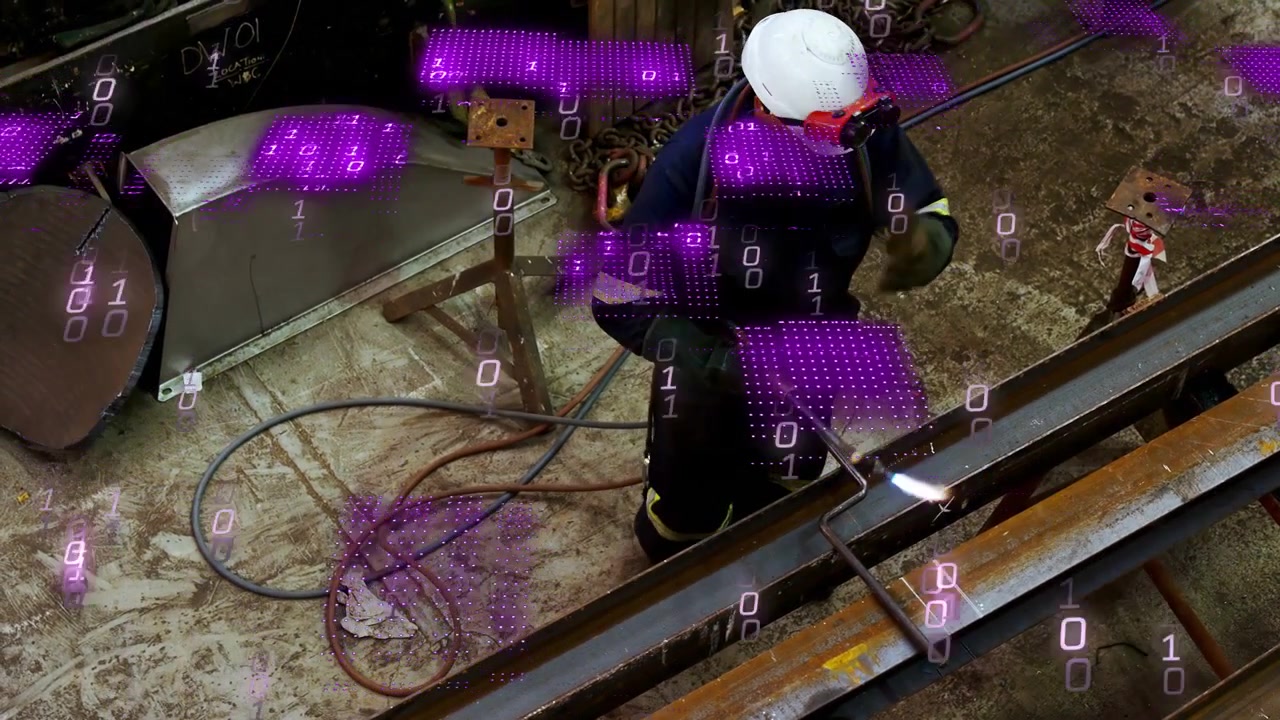 Worker igniting cutting torch and cutting seam for metalwork, purple overlay expanding over beams