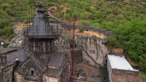 old stone tower at medieval armenia geghard monastery under renovation