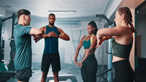 group stretching exercise in gym