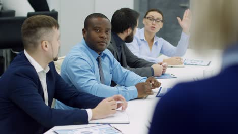 businesswoman asking question at seminar