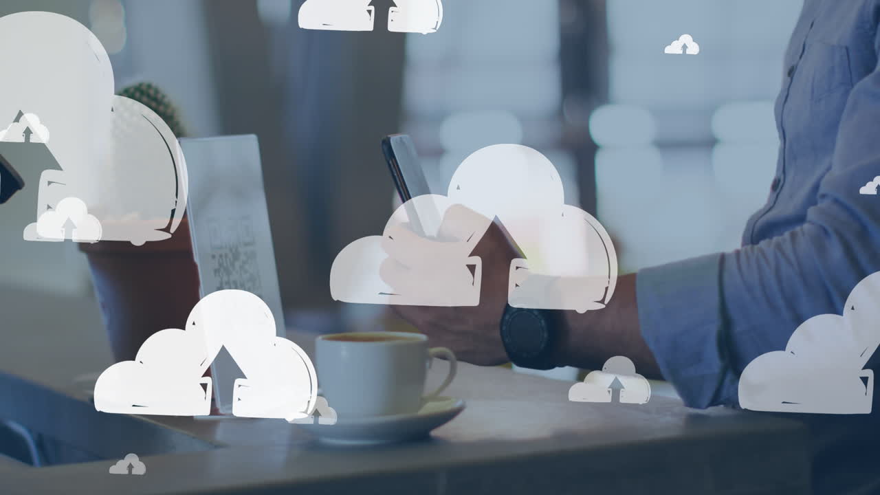 iconos de nube contra la sección media de un hombre caucásico escaneando el código qr con su teléfono inteligente en una cafetería