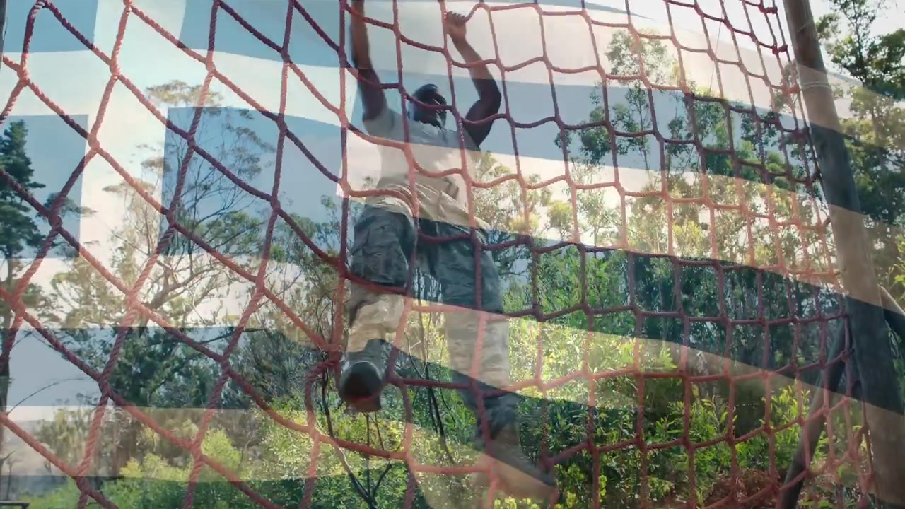 Animation of flag of greece over african american man during obstacle race training