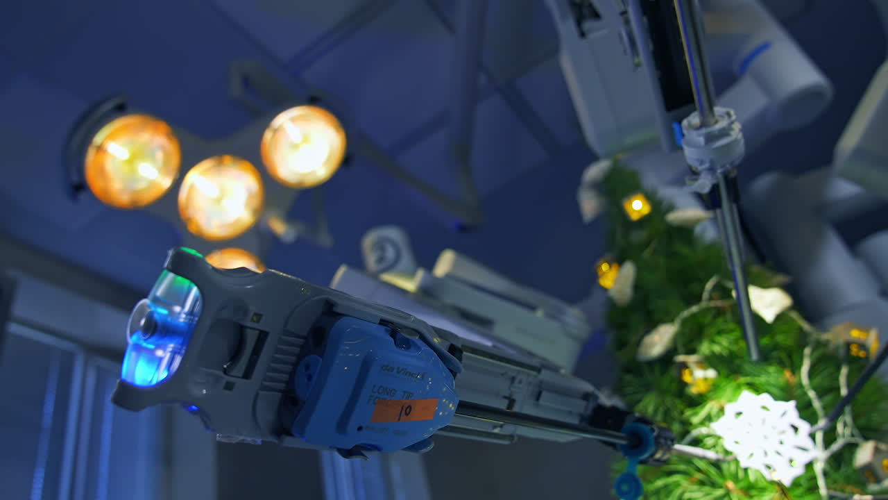 The innovative arms of a robotic surgery equipment decorate Christmas tree. Operating room in modern clinic with futuristic robotic equipment