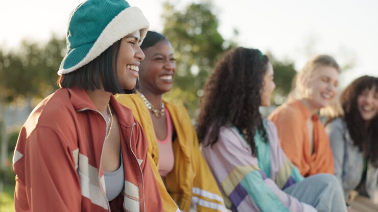 Happy woman, friends and laughing for funny joke