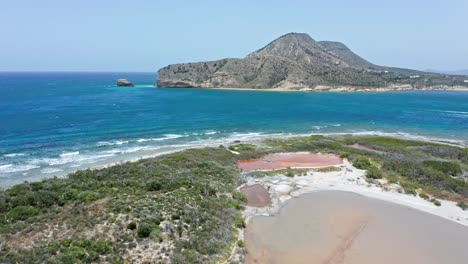 beautiful isla cabra or goat island with headland montecristi in background, dominican republic