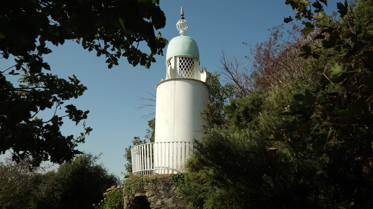 Small Lighthouse On The Coast Of Portmeirion, An Italian Style Village In North Wales, UK
