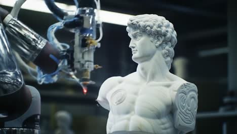 robotic precision in artistry: a robotic arm sculpting a marble bust inspired by classical art with laser technology in a contemporary workshop environment