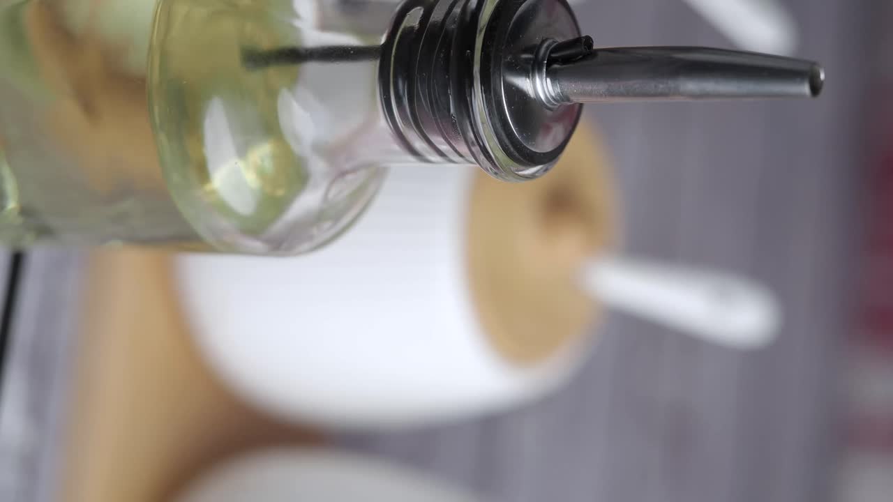 Close-up of Oil Bottle with Pouring Spout