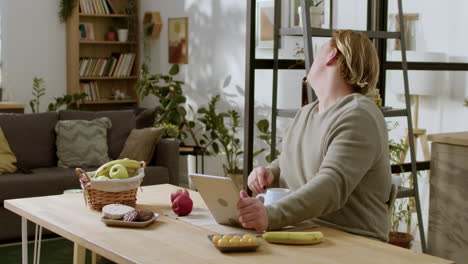 teenager using tablet on the table