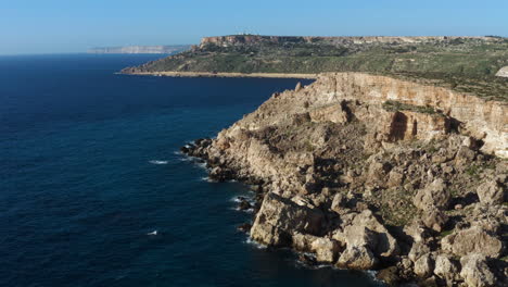 rugged coast in anchor bay near popeye village in the island of malta