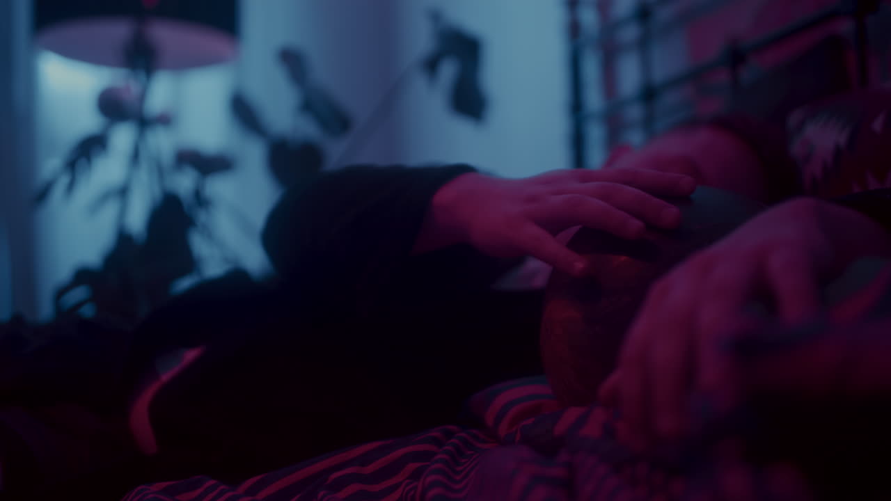 Person Lying in Bed with Crystal Ball