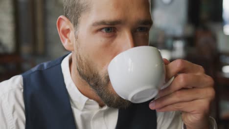 young professional man in a cafe