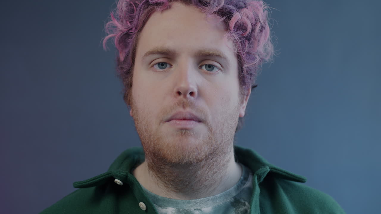 Man Vaping with Pink Hair