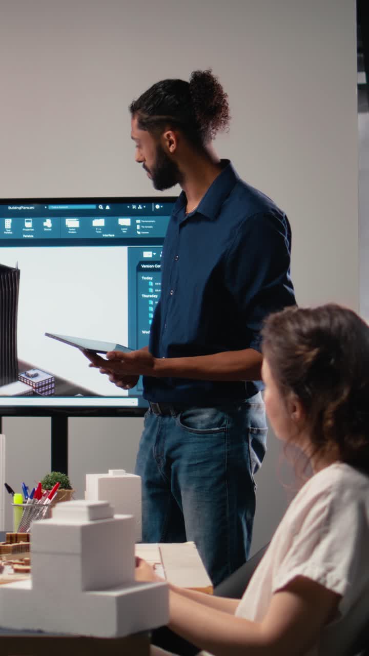 Vertical Video Diverse contractors real estate developers evaluating site preparation