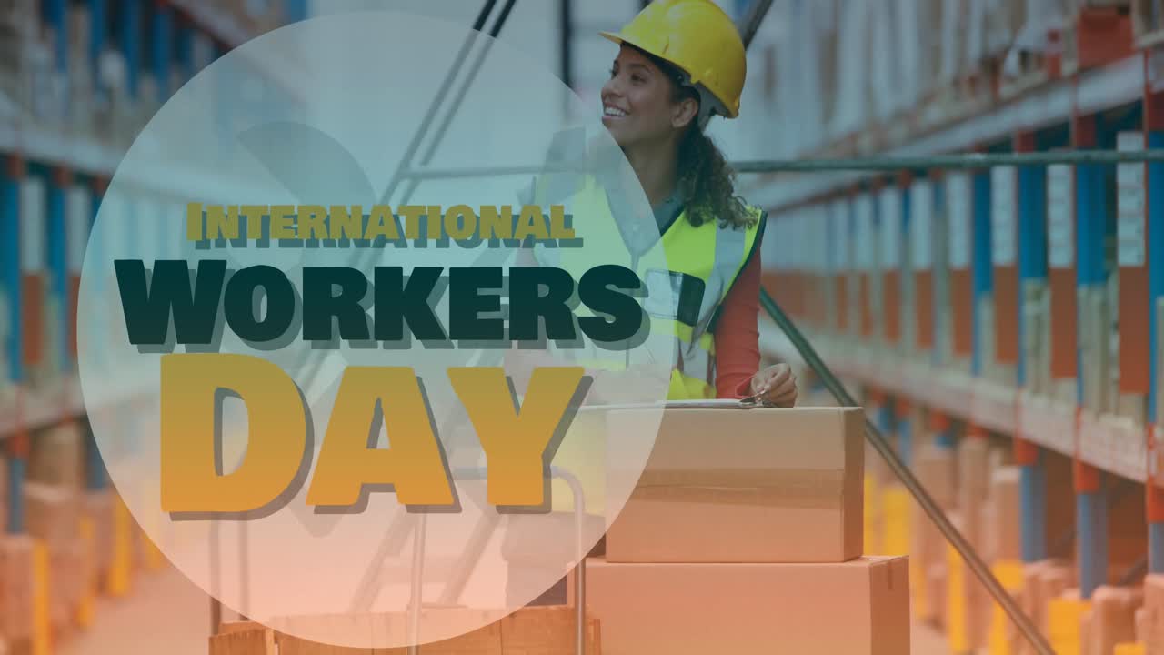 Animation of international workers day over caucasian female engineer
