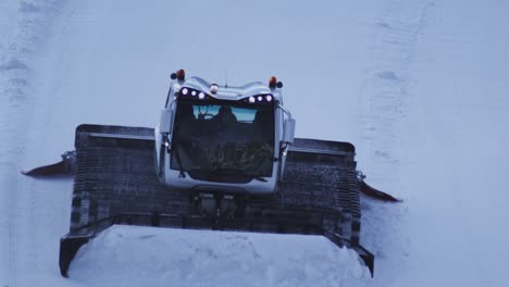 tractor grooming snow