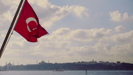 the turkish flag waves in the wind