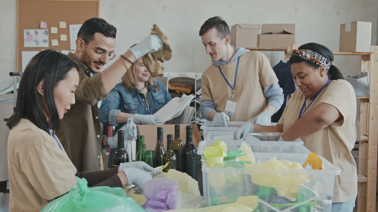 People Sorting out Garbage Indoors