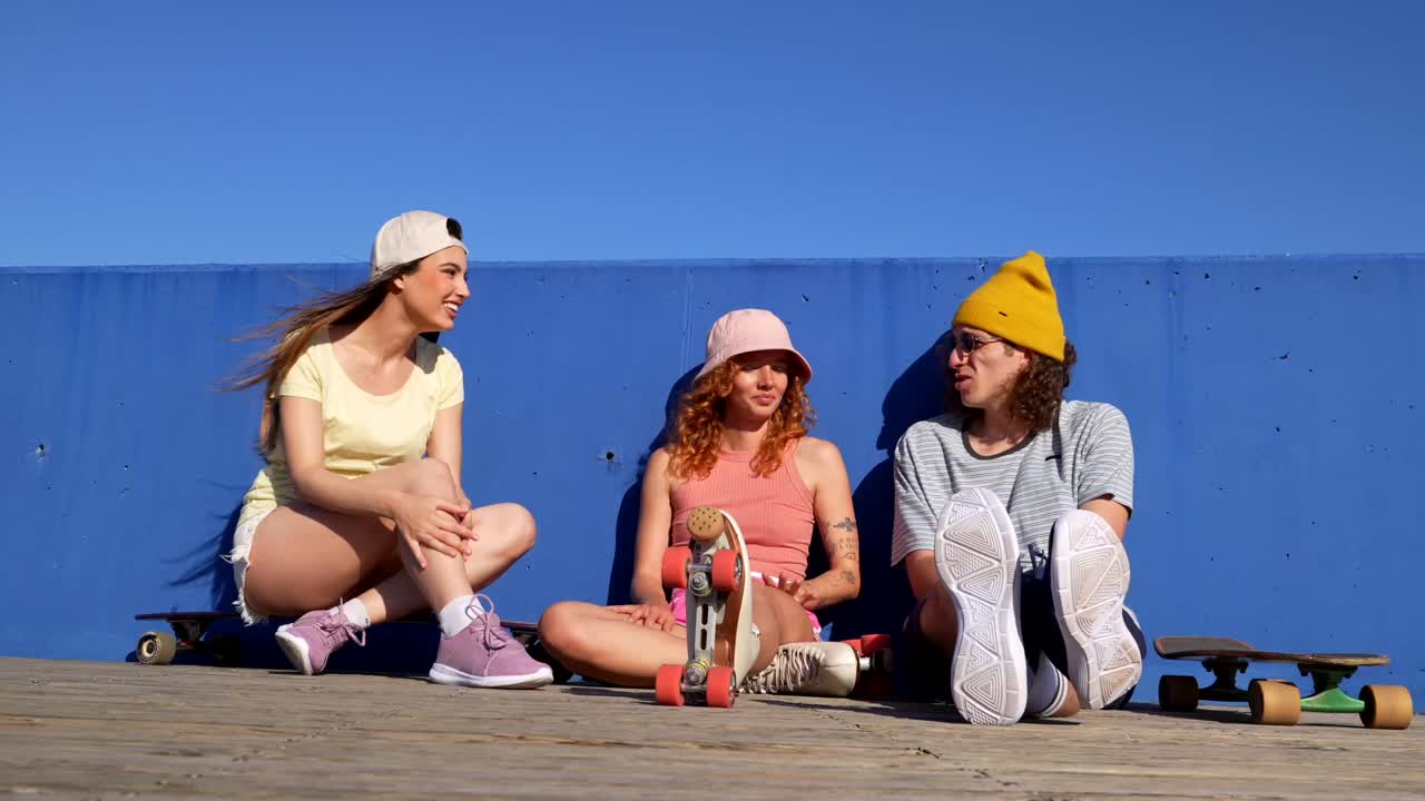 Friends hanging out with skateboards