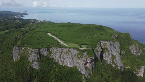 Drone-shot-of-suicide-cliff-in-Saipan,-Northern-Mariana-Islands