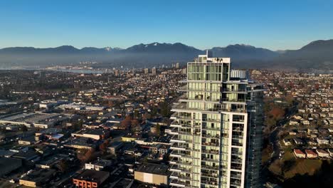 flying by high rise condominiums in burnaby, british columbia, canada