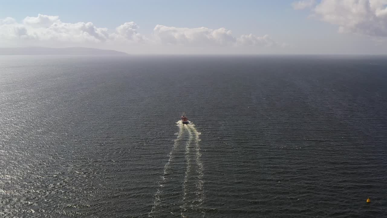 Aerial View of a Boat Traversing the Open Sea
