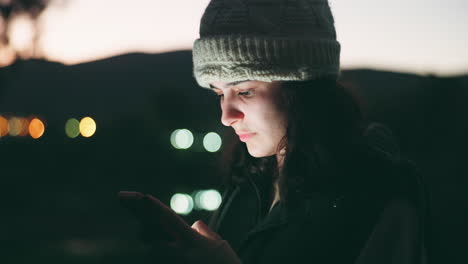 woman, phone and typing at night in city