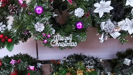 Various-Chic-Christmas-wreath-decoration,-Retail-goods-selling-on-shelf-at-department-store