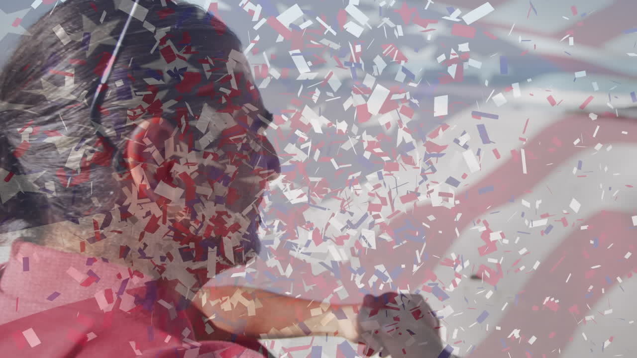 미국 국기의 애니메이션과 해변에 있는 노인 위의 콘페티