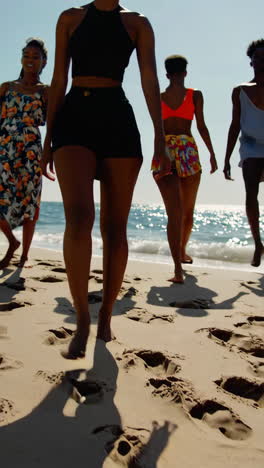 people enjoying a sunny day at the beach and ocean
