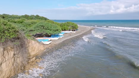 Boats-along-Matanzas-Beachside-in-Bani-City,-Peravia-Province,-Dominican-Republic