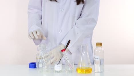 scientist conducts a liquid substance experiment