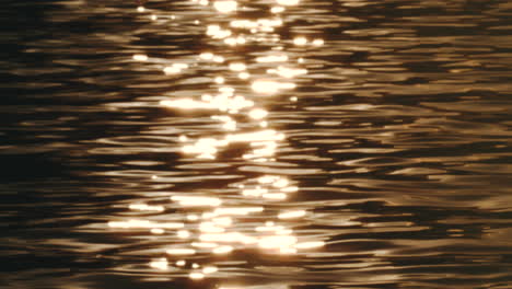 natural beauty and serene atmosphere of water rippling in slow motion at sunset