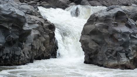 Filming-the-flow-of-a-river-tributary-in-Cotalo,-Tungurahua-province,-Ecuador