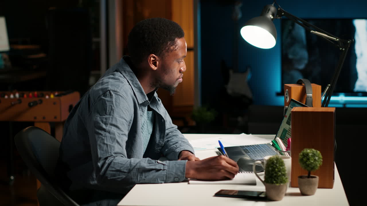 Remote worker in a cozy apartment organizing data and writing articles