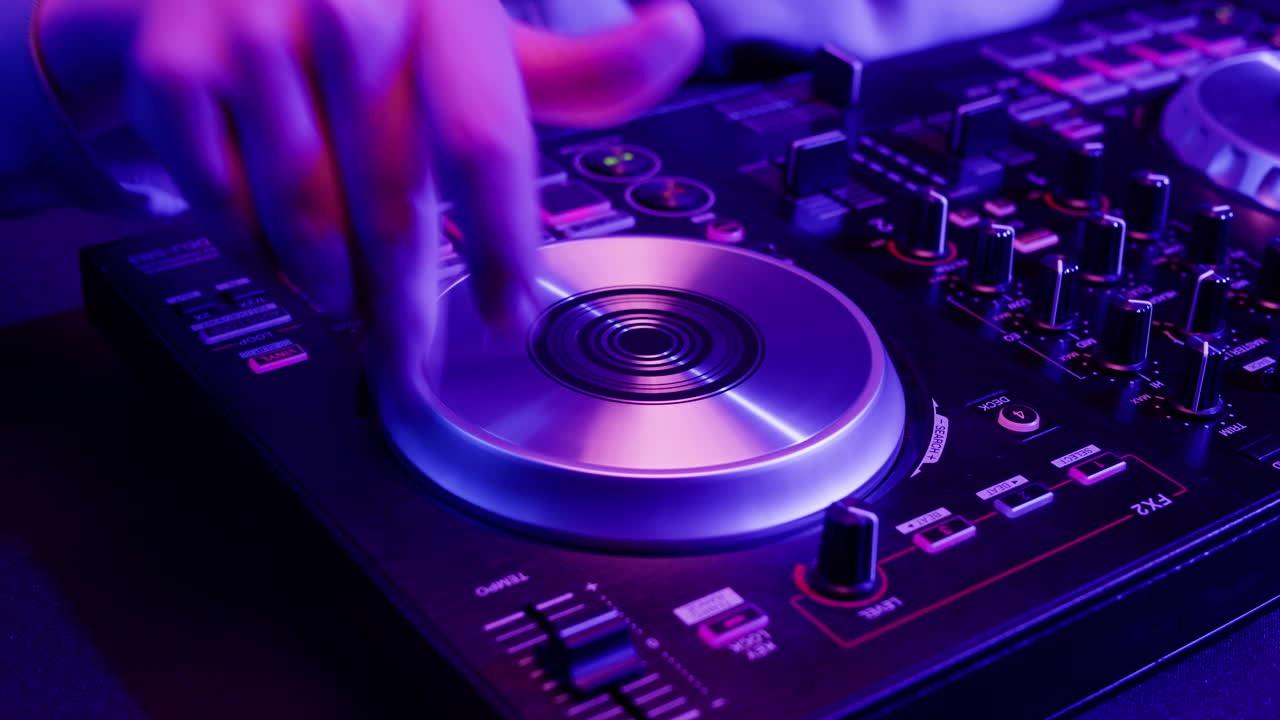 Vibrant DJ Mix Performance Closeup view of hands and equipment during a live music performance, city event, dj set in music techno club