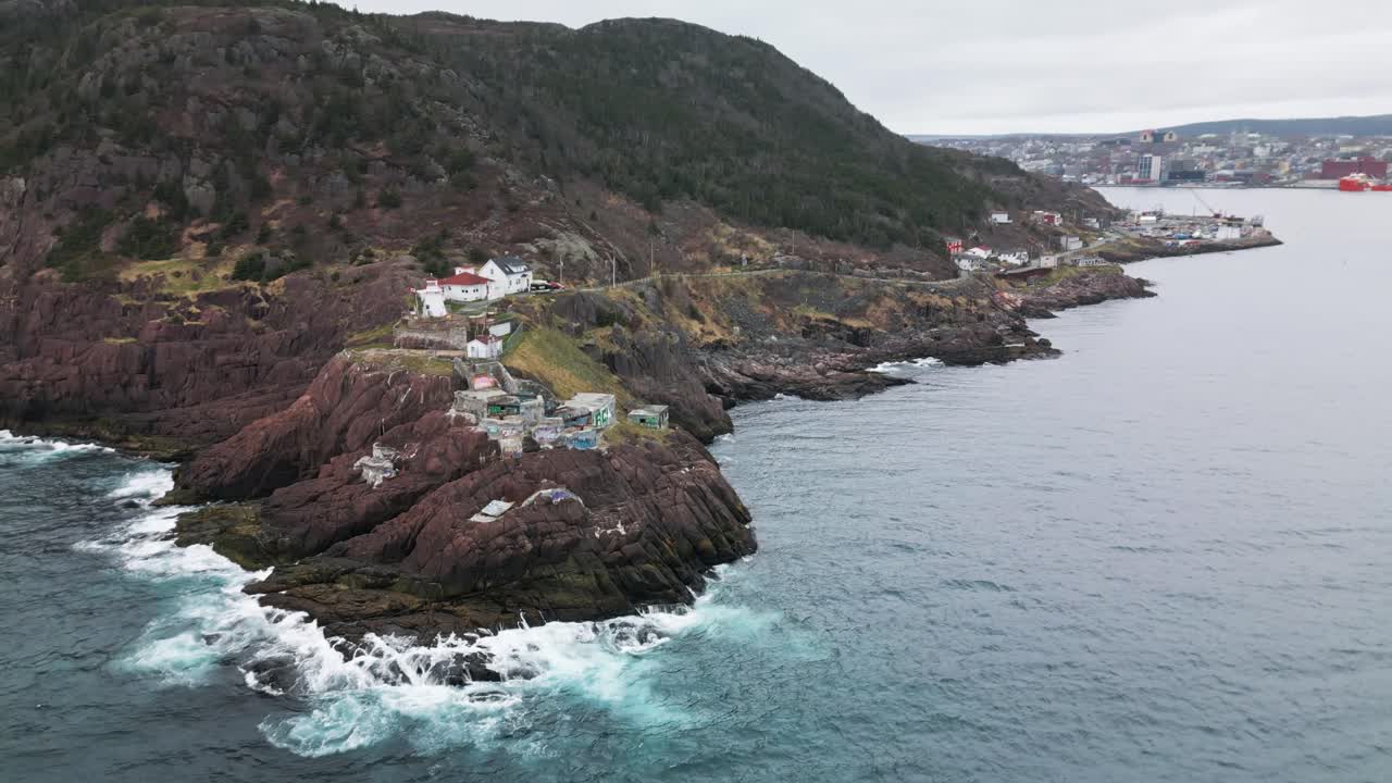 Drone shot of Fort Amherst in St John's, Newfoundland, Canada. Spinning around the point to reveal the coastline.