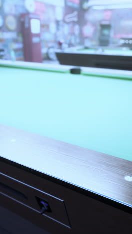 close-up of a pool table in a game room