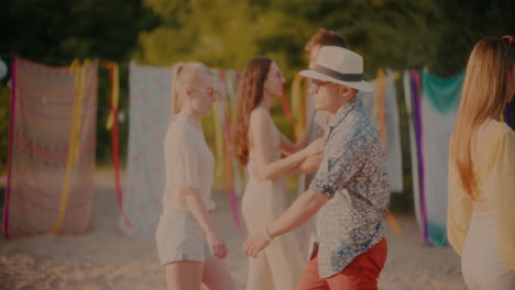 people walking past by smiling couple looking at each other