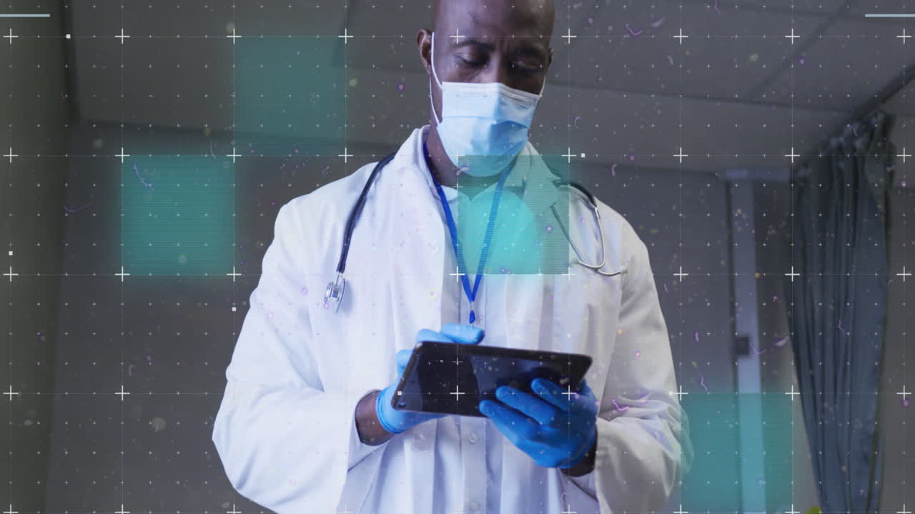 Animation of data processing over male african american doctor wearing face mask using tablet