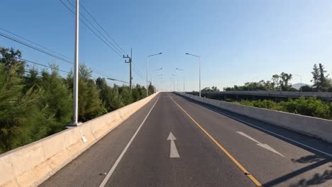 progression of travel over a bridge during daytime