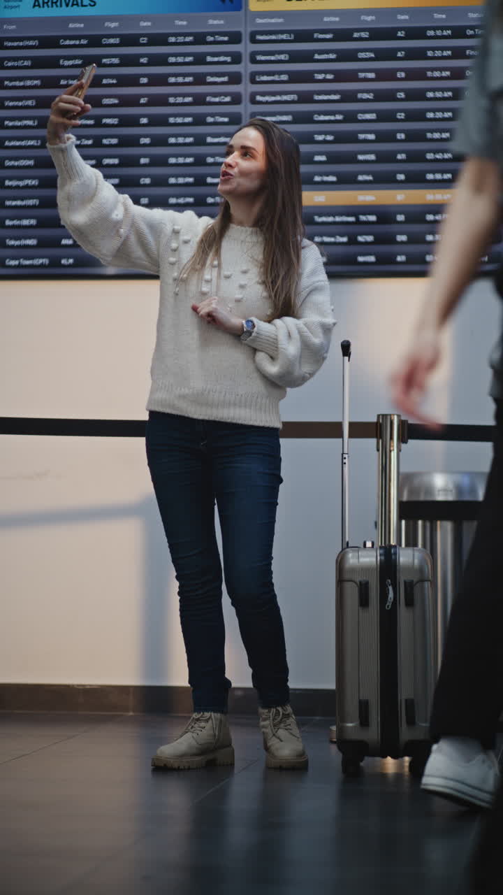 Airport Scene with Woman Taking Selfie and Wheelchair