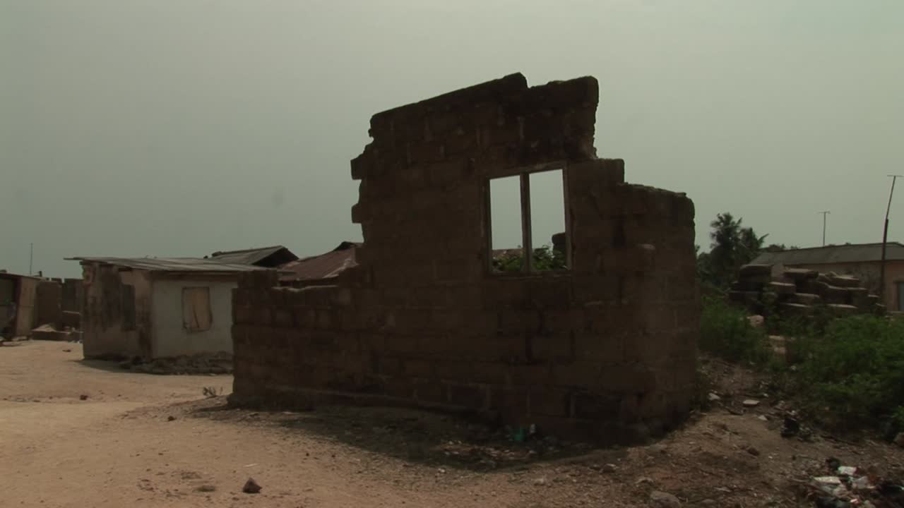 Abandoned unfinished brick building in a rural area of Ghana ...