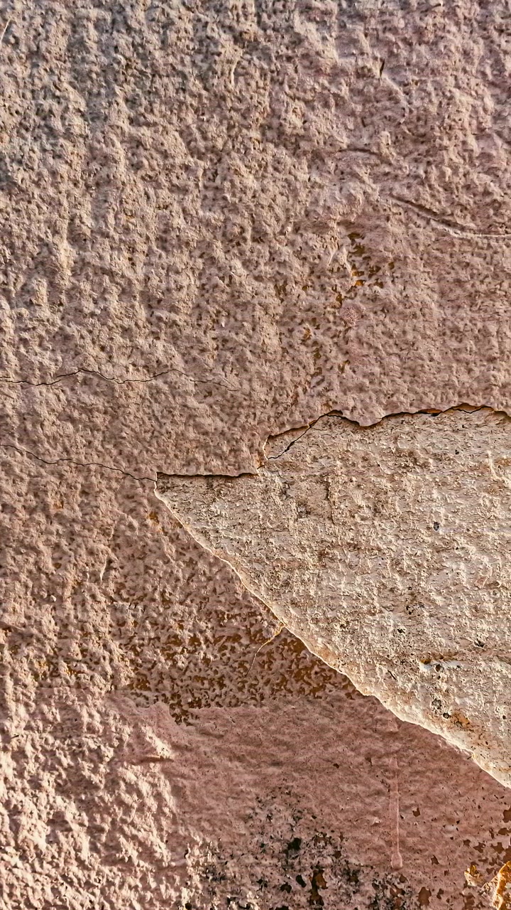 Rough textured stone wall surface