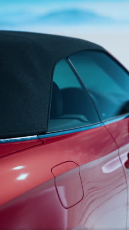 close up of a red convertible car