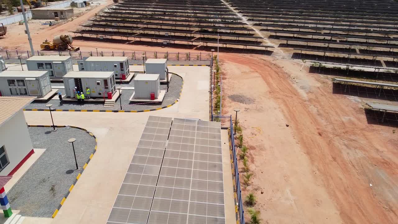 Completed construction and installation of Solar PV Power Plant facilities with Battery Energy Storage System (BESS), solar car shed and numerous solar arrays - aerial panorama view