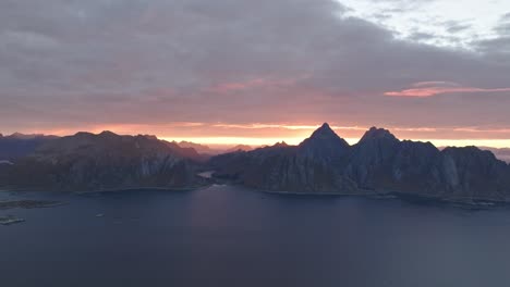 the sun breaking over the mountains in valberg norwway taken with a drone early in the morning with a breathtaking view