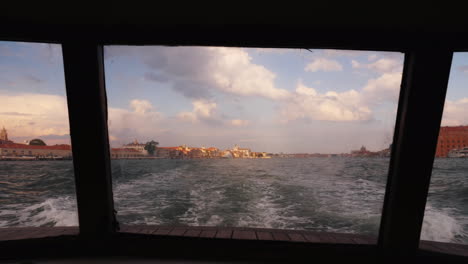 Venetian-Cityscape-Through-Boat-Window