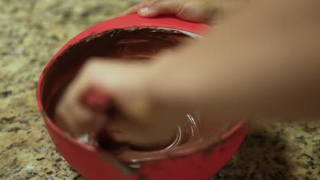 bowl with melted chocolate confectioner prepare premium hand-crafted