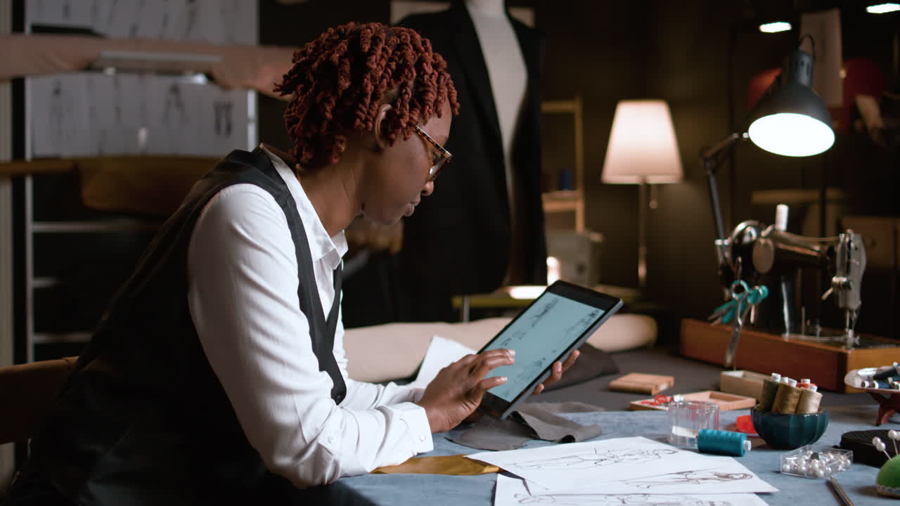 Black woman in the tailor shop